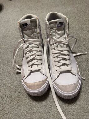 Nike White High-Top Sneakers with silver Accents